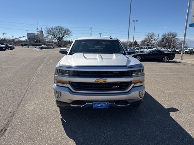 Used 2018 Chevrolet Silverado 1500 LT with VIN 3GCUKREC0JG625613 for sale in Morris, Minnesota